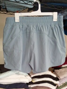 lululemon athletica soft light blue shorts with logo tag Shake It Out 14